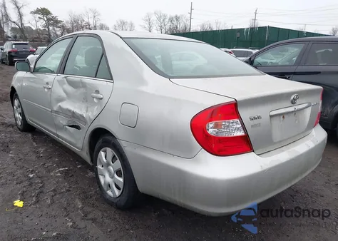 2003 Toyota Camry Le z USA, uszkodzony, nr VIN 4T1BE32K73U140341